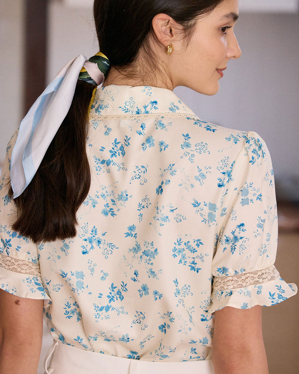 Lace-Trimmed Pleated Floral Blouse