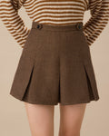 Brown Striped Pleated Mini Skirt" can be rewritten as "Striped Mini Skirt with Pleats in Brown.
