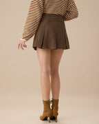 Brown Striped Pleated Mini Skirt" can be rewritten as "Striped Mini Skirt with Pleats in Brown.