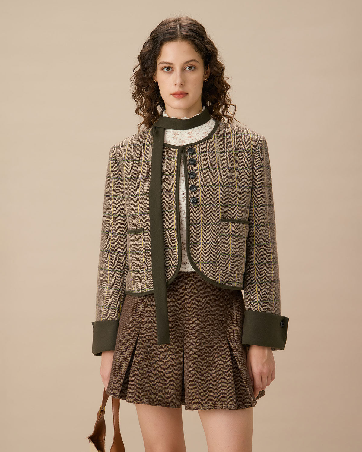 Brown Striped Pleated Mini Skirt" can be rewritten as "Striped Mini Skirt with Pleats in Brown.