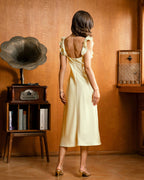 Yellow Satin Midi Dress with Square Neck and Ruffle Details
