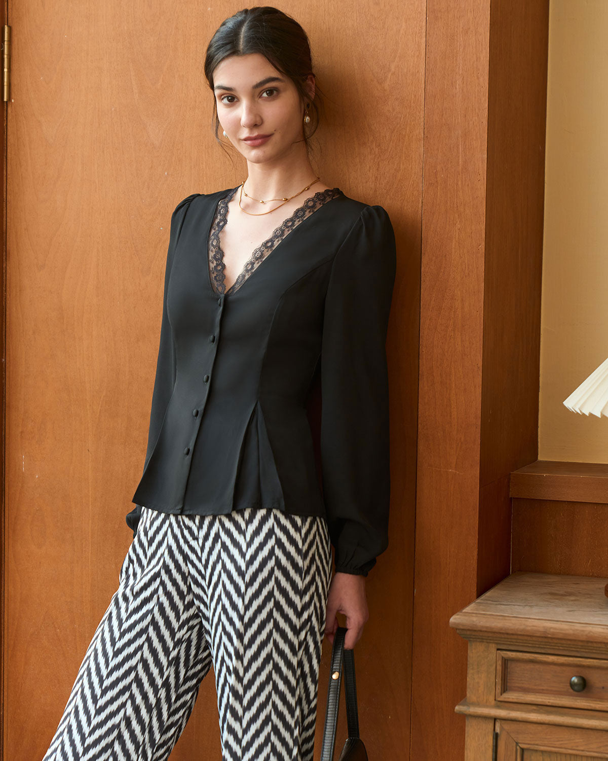 Black V-Neck Blouse with Lace Trim and Button Details