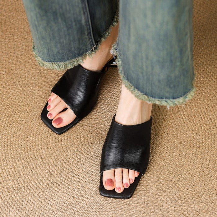 Virelle Curve Leder Mules mit Absatz