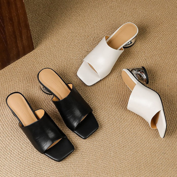 Virelle Curve Leder Mules mit Absatz