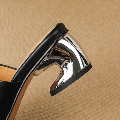 Virelle Curve Leder Mules mit Absatz