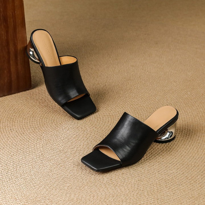 Virelle Curve Leder Mules mit Absatz