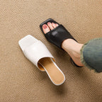 Virelle Curve Leder Mules mit Absatz