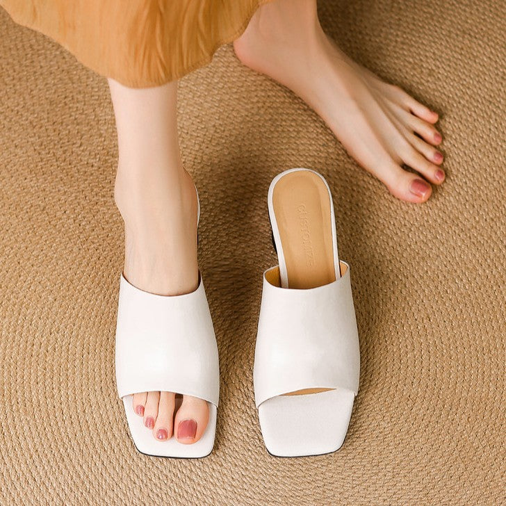 Virelle Curve Leder Mules mit Absatz