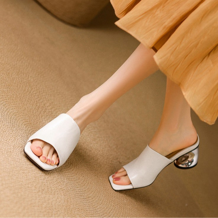 Virelle Curve Leder Mules mit Absatz