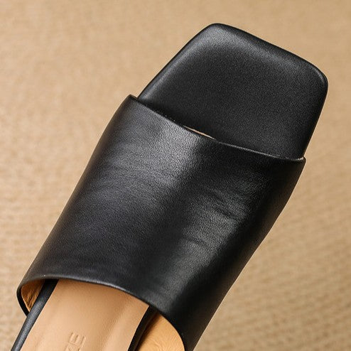 Virelle Curve Leder Mules mit Absatz