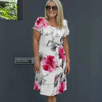 Lyrra | Florales Eleganzkleid