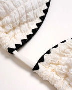White Triangle Bikini Set with Contrasting Details