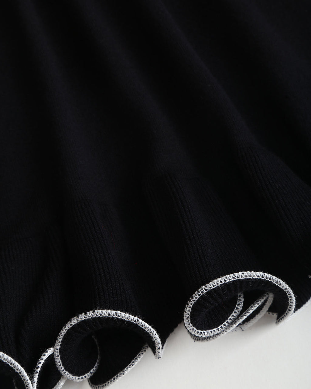 Mini Dress with Ruffled Black Ribbed Sweater Design