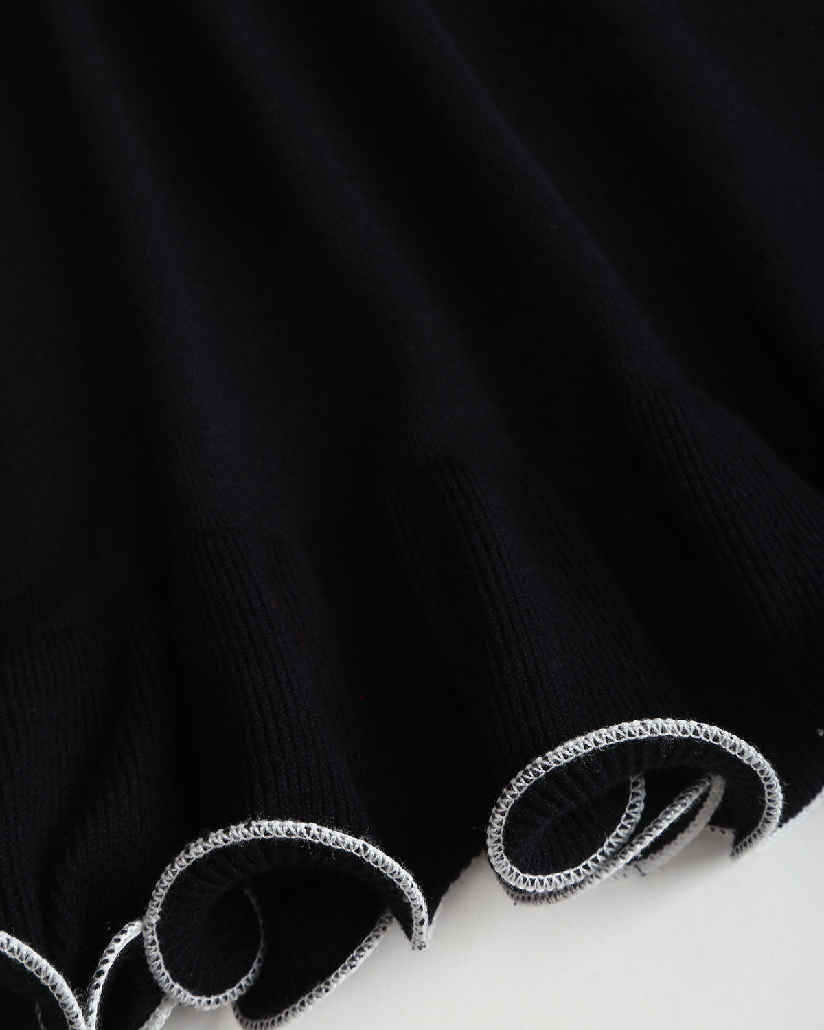 Mini Dress with Ruffled Black Ribbed Sweater Design