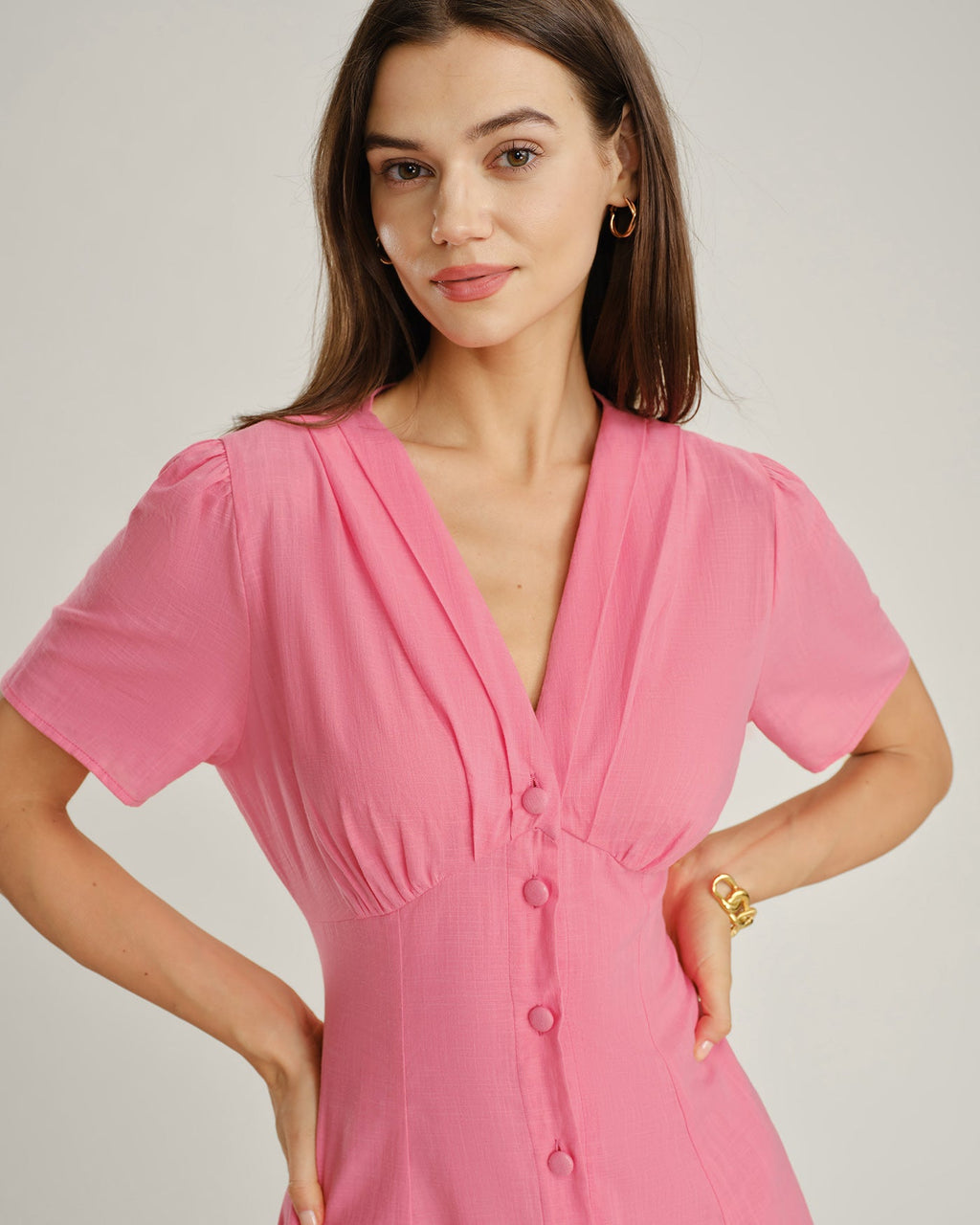 Pink V-Neck Midi Dress with Ruched Detailing and Button Accents