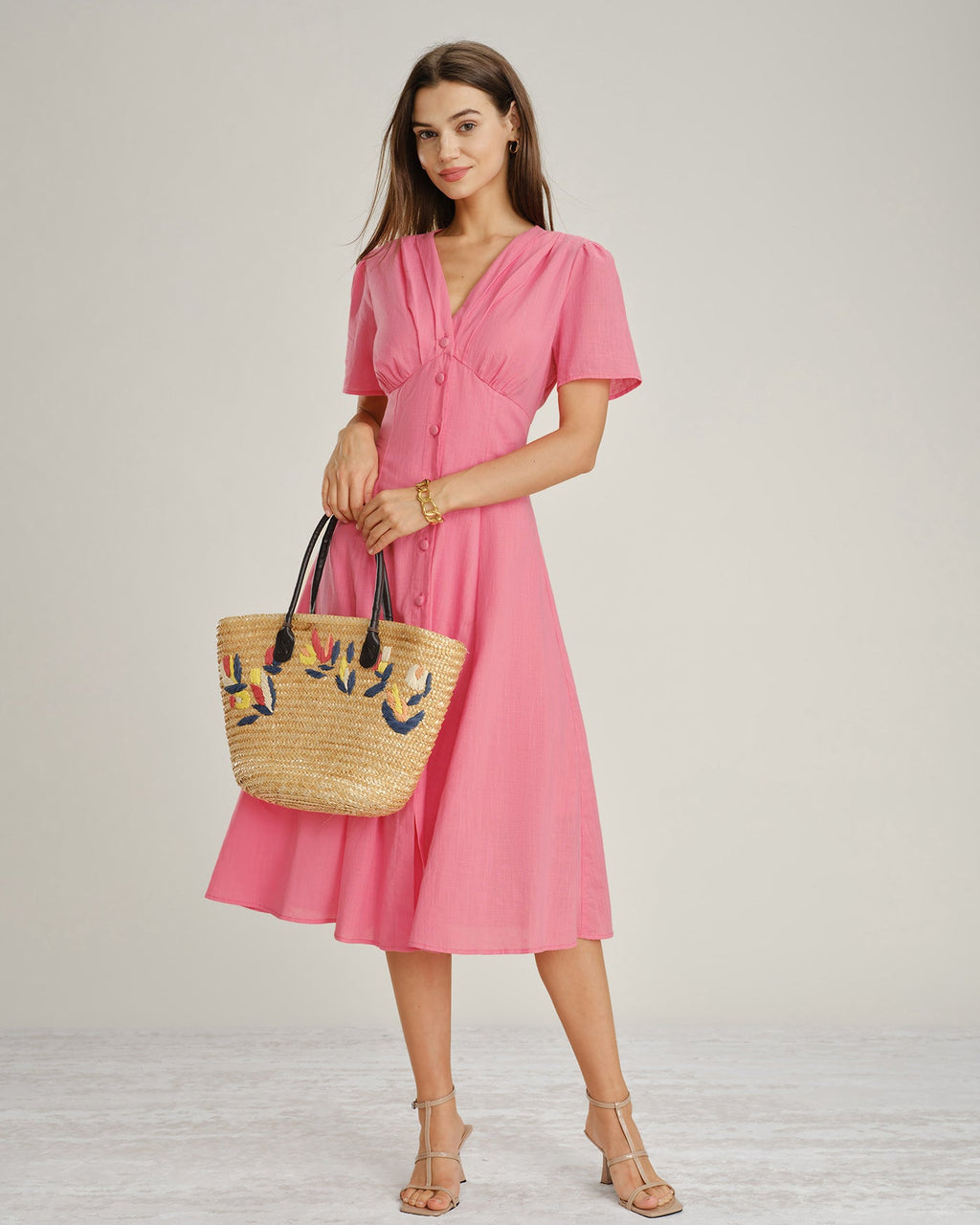 Pink V-Neck Midi Dress with Ruched Detailing and Button Accents