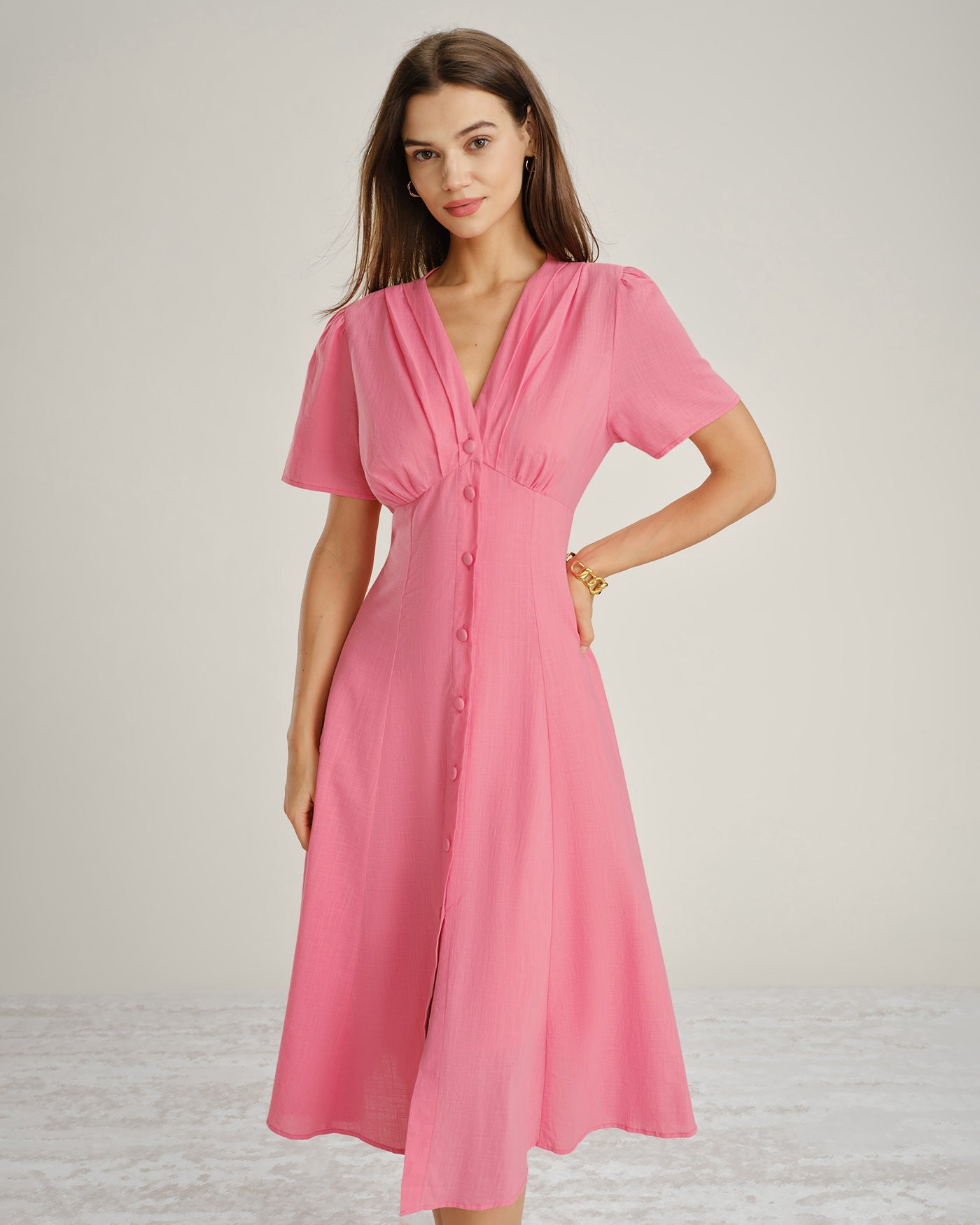 Pink V-Neck Midi Dress with Ruched Detailing and Button Accents