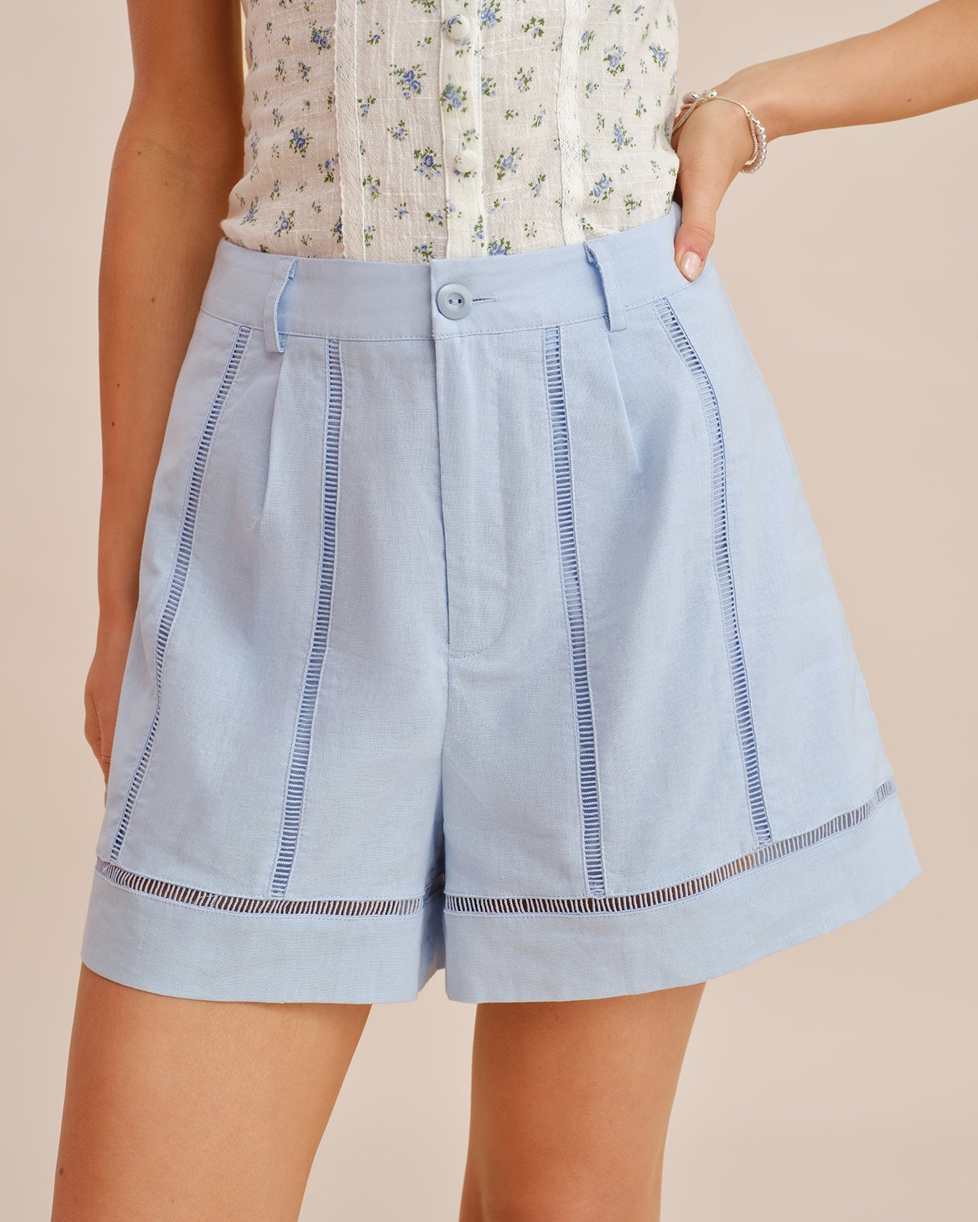 Cut-Out Zipper Shorts with Blue Button Detail