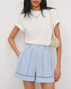 Cut-Out Zipper Shorts with Blue Button Detail