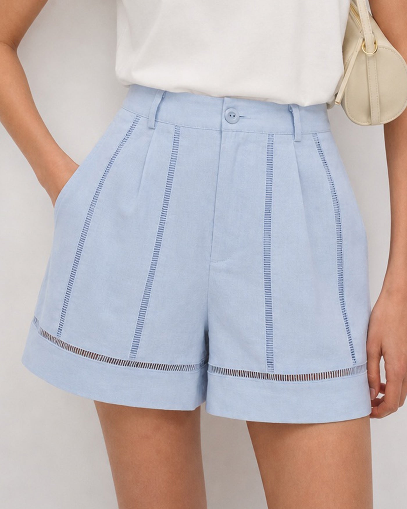 Cut-Out Zipper Shorts with Blue Button Detail