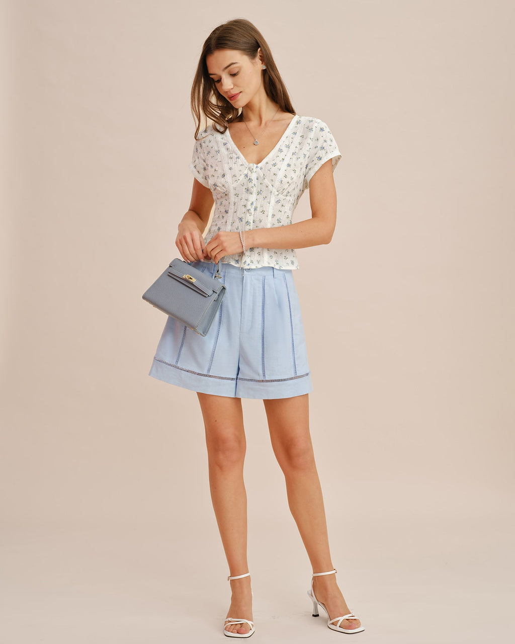 Cut-Out Zipper Shorts with Blue Button Detail