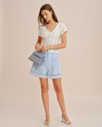 Cut-Out Zipper Shorts with Blue Button Detail
