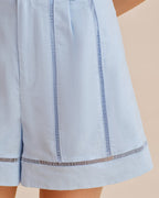 Cut-Out Zipper Shorts with Blue Button Detail