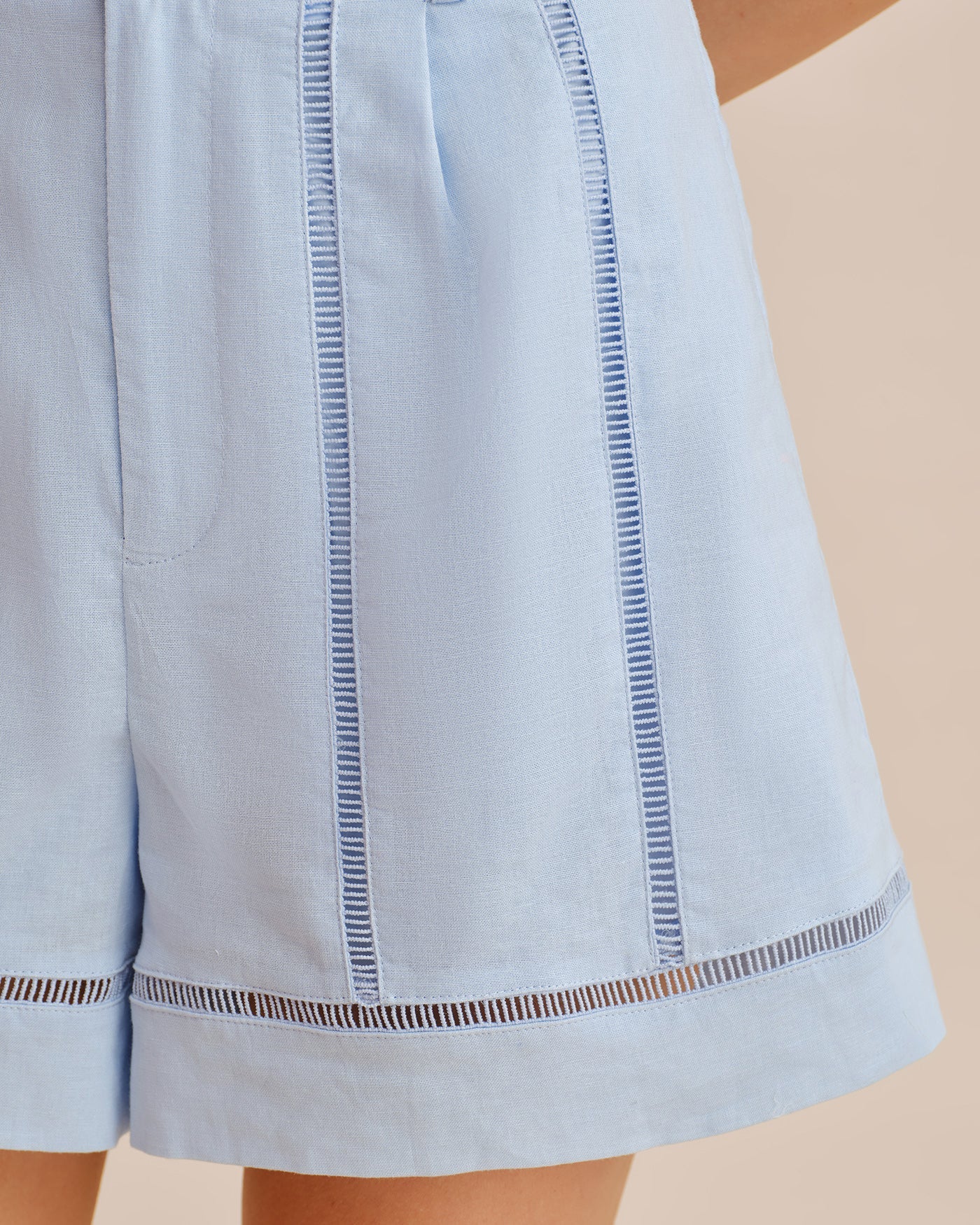 Cut-Out Zipper Shorts with Blue Button Detail