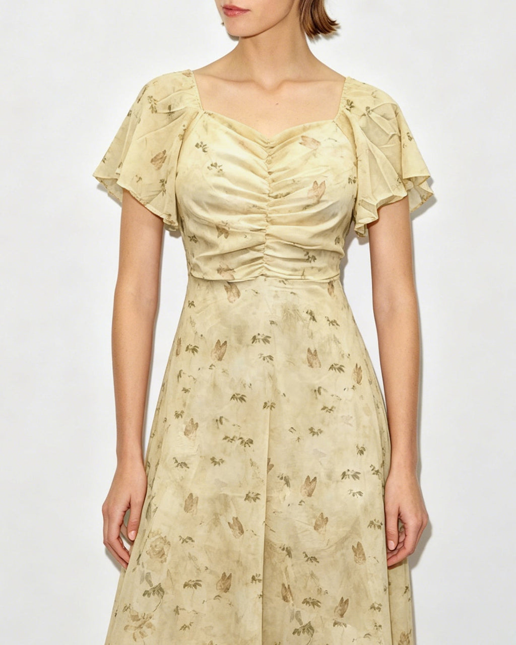 Floral Maxi Dress with V-Neck and Ruched Details in Yellow