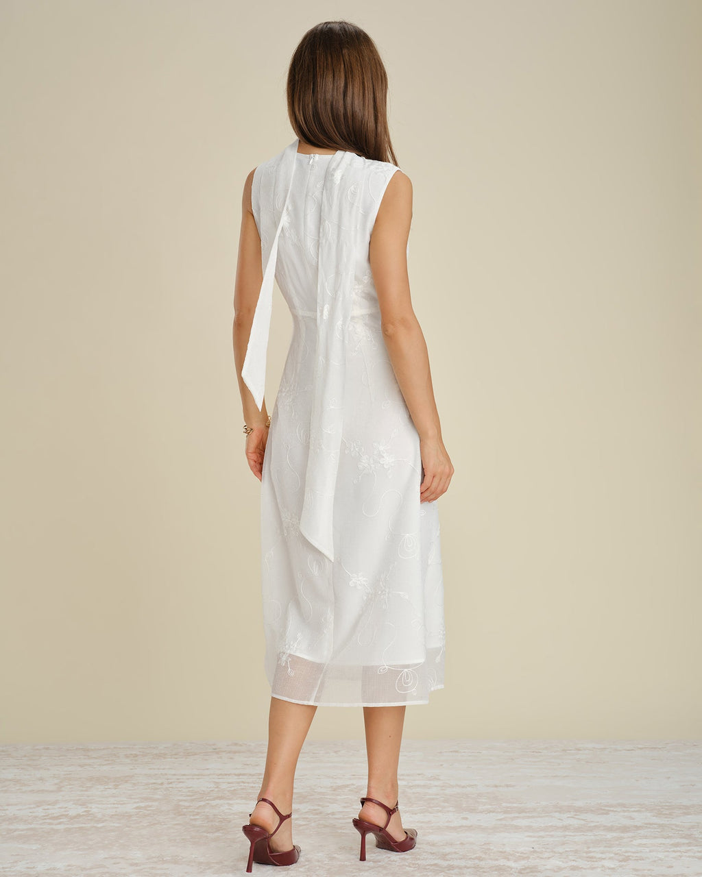 White Midi Dress with Floral Embroidery and V-Neck