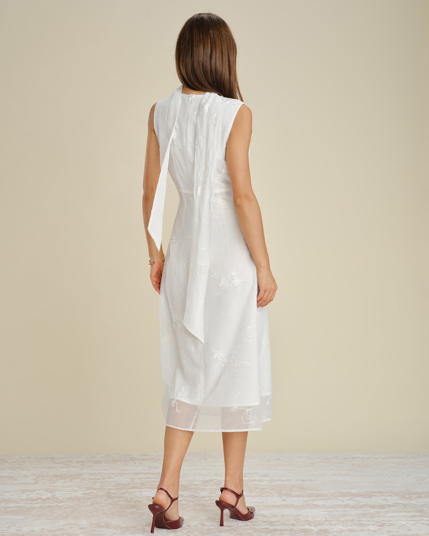 White Midi Dress with Floral Embroidery and V-Neck
