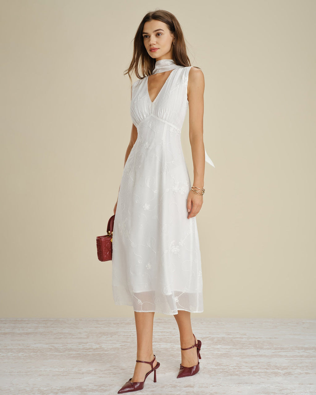 White Midi Dress with Floral Embroidery and V-Neck