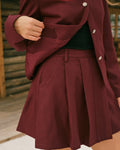Wine Red Pleated A-Line Mini Skirt" can be rewritten as "Pleated A-Line Mini Skirt in Wine Red.