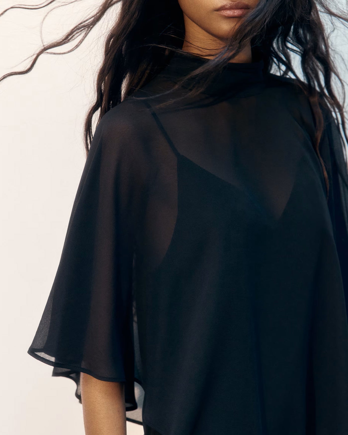 Mini Dress with Black Turtle Neck and Cape Sleeves