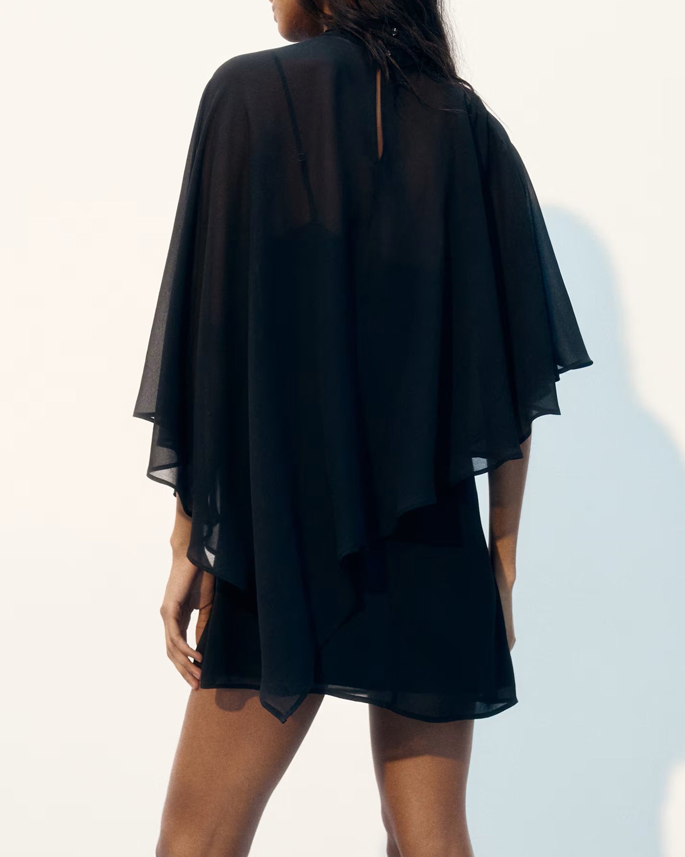 Mini Dress with Black Turtle Neck and Cape Sleeves