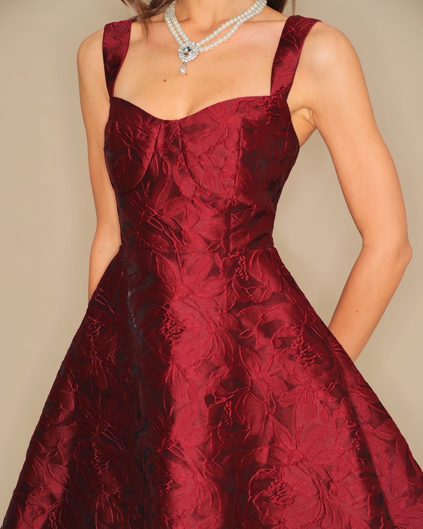 Wine Red Sweetheart Neck Jacquard Mini Dress" can be rewritten as "Jacquard Mini Dress with Sweetheart Neckline in Wine Red.