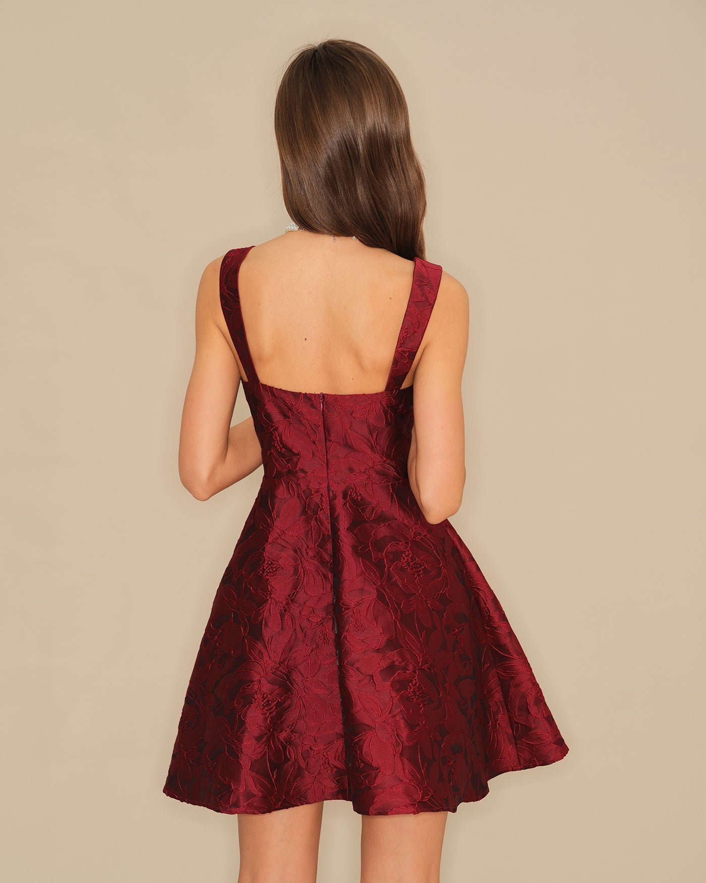 Wine Red Sweetheart Neck Jacquard Mini Dress" can be rewritten as "Jacquard Mini Dress with Sweetheart Neckline in Wine Red.