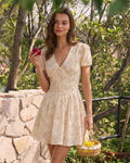 Floral Mini Dress with Orange V-Neck and Tie Detail