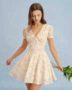 Floral Mini Dress with Orange V-Neck and Tie Detail