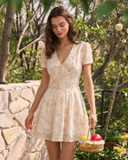 Floral Mini Dress with Orange V-Neck and Tie Detail